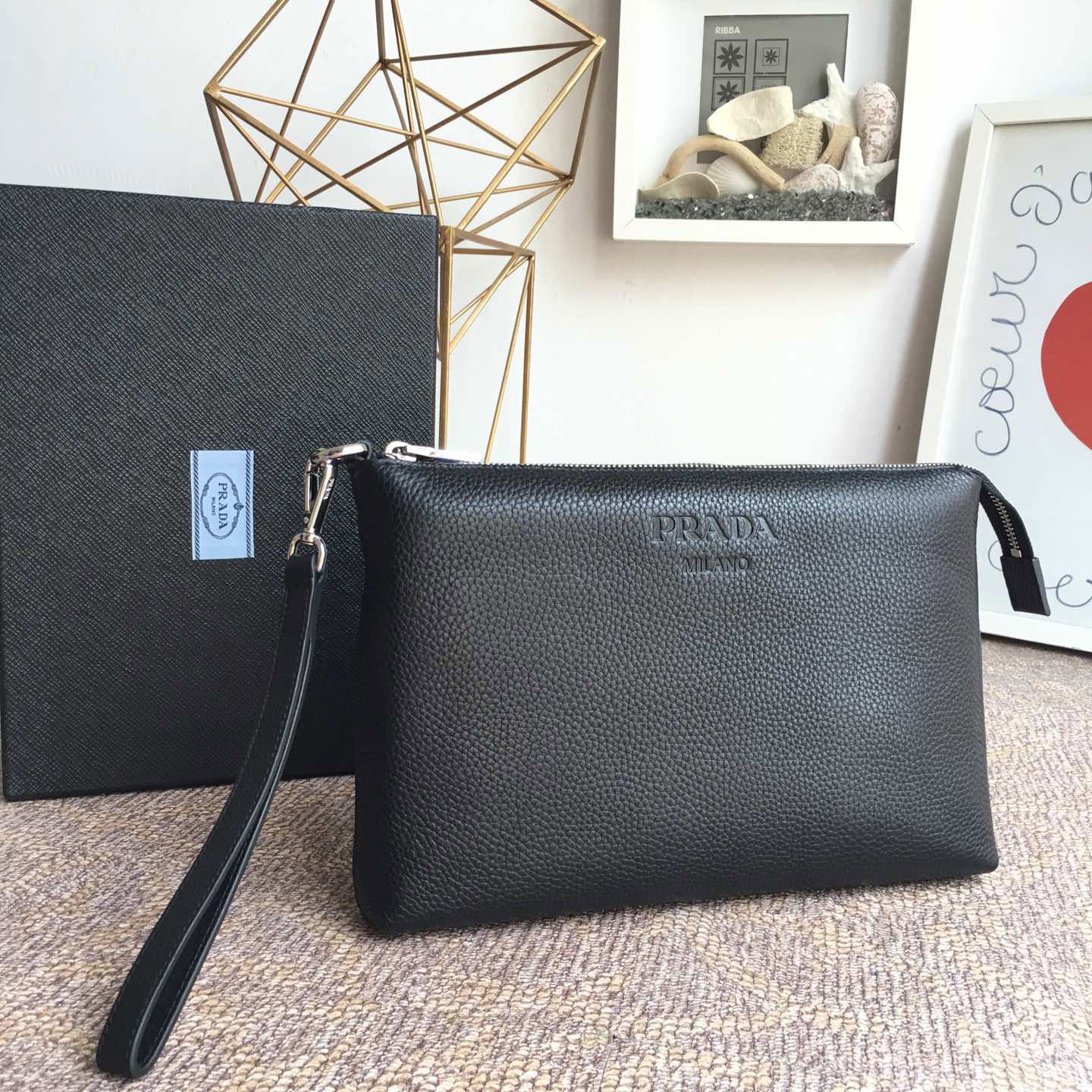 Pra*a clutch bags